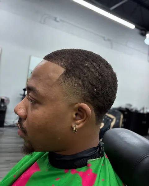 Skin fade blended into a full beard
