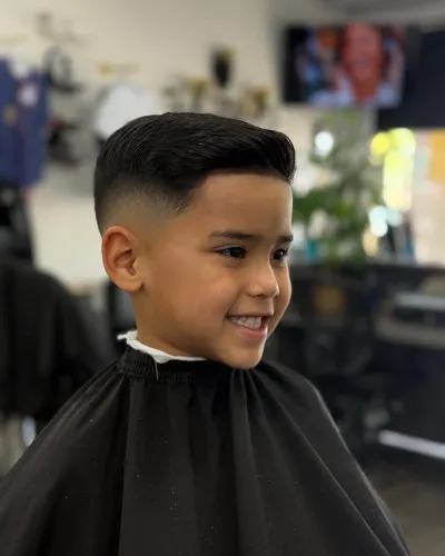 Front angle of a young client fade