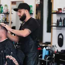 Anthony Capra cutting a client at Victory Barbershop in Boca Raton